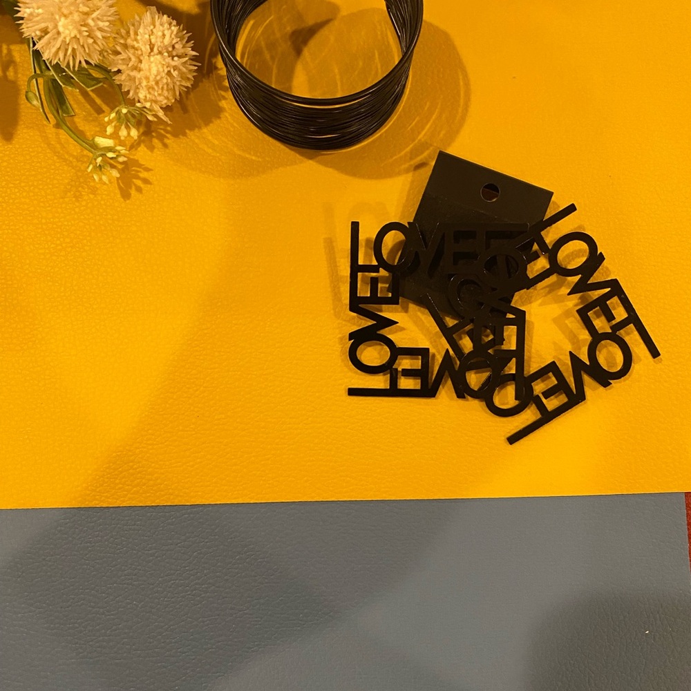 Black LOVE Word Cutout Earrings